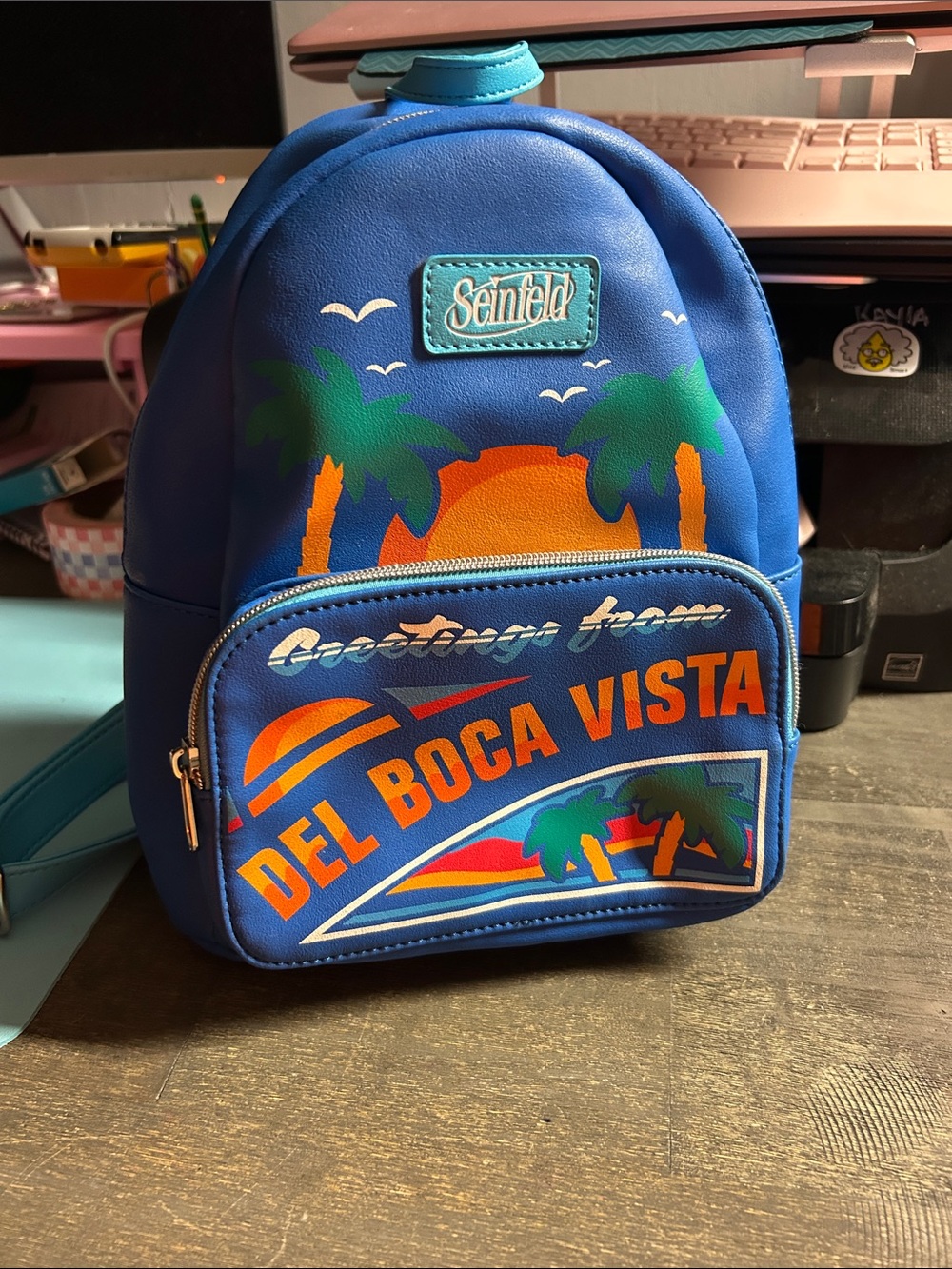 Funko Seinfeld‎ Greetings from Del Boca Vista mini backpack sunset and palm tree